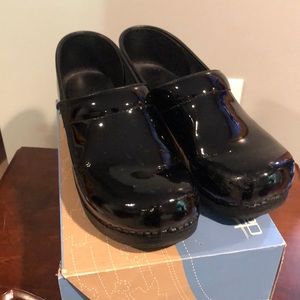 Dansko Patent Black Clogs